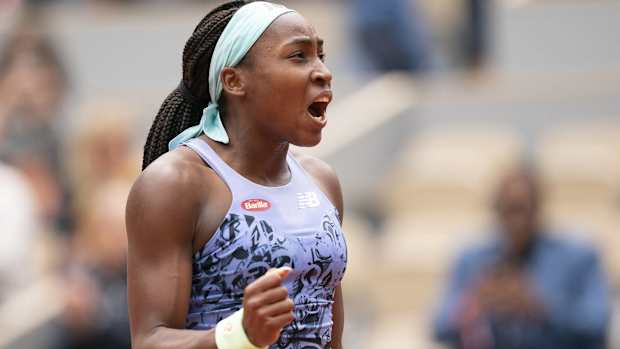 Coco Gauff celebrates a French Open win.