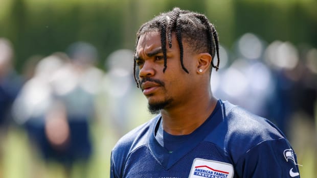 Seattle Seahawks wide receiver Bo Melton (81) returns to the locker room following an OTA workout at the Virginia Mason Athletic Center.