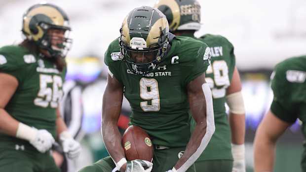 Colorado State Rams wide receiver Warren Jackson (9) celebrates his touchdown reception in the second quarter against the Boise State Broncos at Sonny Lubick Field at Canvas Stadium.