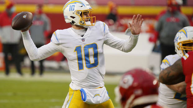 Jan 3, 2021; Kansas City, Missouri, USA; Los Angeles Chargers quarterback Justin Herbert (10) throws a pass against the Kansas City Chiefs during the first half at Arrowhead Stadium. Mandatory Credit: Jay Biggerstaff-USA TODAY Sports