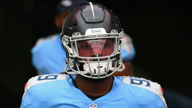Oct 25, 2020; Nashville, Tennessee, USA; Tennessee Titans outside linebacker Jadeveon Clowney (99) takes the field before the game against the Pittsburgh Steelers at Nissan Stadium. Mandatory Credit: Christopher Hanewinckel-USA TODAY Sports