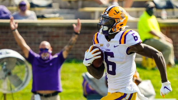 Oct 10, 2020; Columbia, Missouri, USA; LSU Tigers wide receiver Terrace Marshall Jr. (6) runs for a touchdown against the Missouri Tigers during the second half at Faurot Field at Memorial Stadium. Mandatory Credit: Jay Biggerstaff-USA TODAY Sports