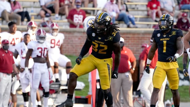 Sep 26, 2020; Columbia, Missouri, USA; Missouri Tigers linebacker Nick Bolton (32) celebrates after making a tackle against the Alabama Crimson Tide during the first half at Faurot Field at Memorial Stadium. Mandatory Credit: Denny Medley-USA TODAY Sports