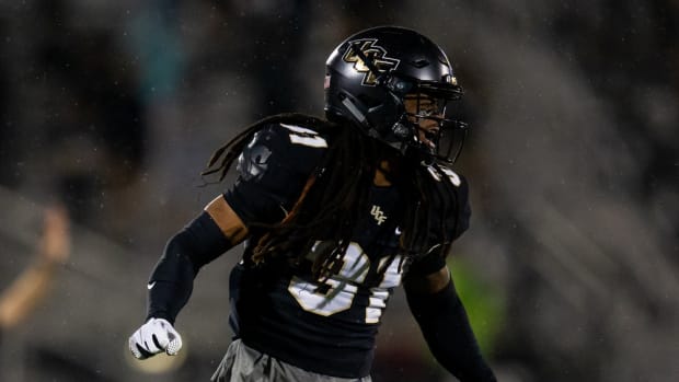 Oct 3, 2020; Orlando, Florida, USA; UCF Knights defensive back Aaron Robinson (31) celebrates a stop during the first quarter of a game against the Tulsa Golden Hurricane at Spectrum Stadium.