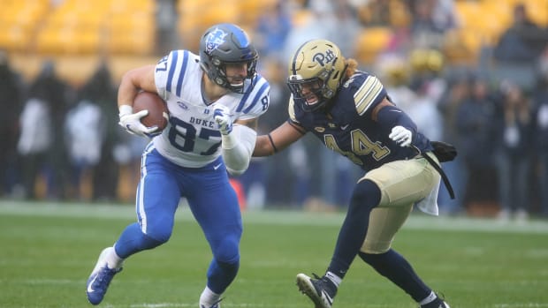 Oct 27, 2018; Pittsburgh, PA, USA; Duke Blue Devils tight end Noah Gray (87) runs after a catch against Pittsburgh Panthers linebacker Elias Reynolds (44) during the first quarter at Heinz Field. Mandatory Credit: Charles LeClaire-USA TODAY Sports