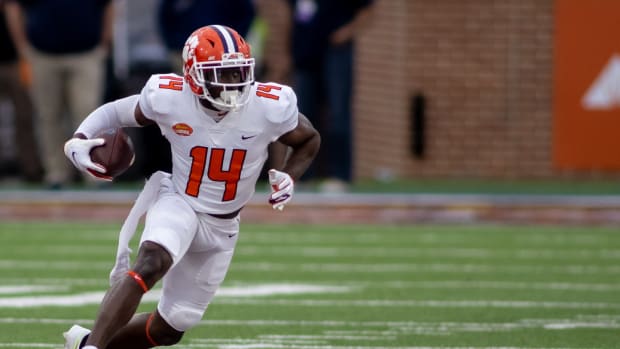 Jan 30, 2021; Mobile, AL, USA; American wide receiver Cornell Powell of Clemson (14) gets loose in the second half of the 2021 Senior Bowl at Hancock Whitney Stadium. Mandatory Credit: Vasha Hunt-USA TODAY Sports
