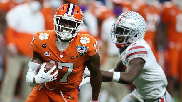 Jan 1, 2021; New Orleans, LA, USA; Clemson Tigers wide receiver Cornell Powell (17) runs the ball past Ohio State Buckeyes cornerback Sevyn Banks (7) during the second half at Mercedes-Benz Superdome. Mandatory Credit: Chuck Cook-USA TODAY Sports