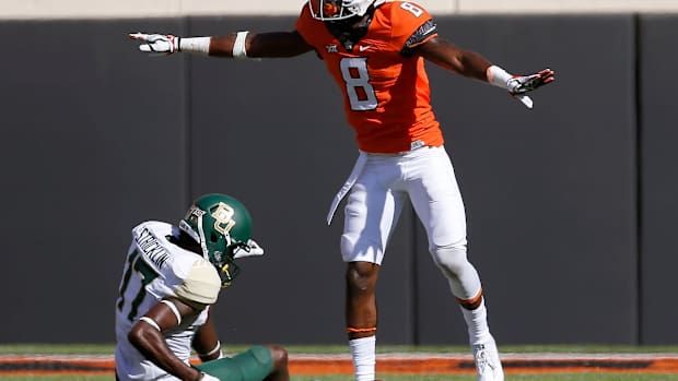 Oklahoma State's Rodarius Williams (8) was drafted by the New York Giants in the sixth round of the NFL Draft on Saturday.
