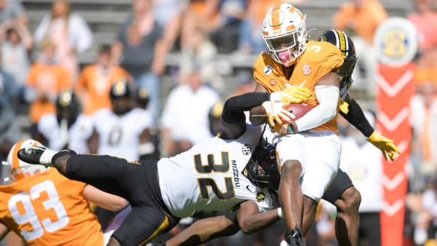 Oct 3, 2020; Knoxville, TN, USA; Tennessee running back Eric Gray (3) is tackled by Missouri linebacker Nick Bolton (32) in the fourth quarter during a game between Tennessee and Missouri at Neyland Stadium in Knoxville, Tenn. on Saturday, Oct. 3, 2020. Mandatory Credit: Calvin Mattheis-USA TODAY NETWORK