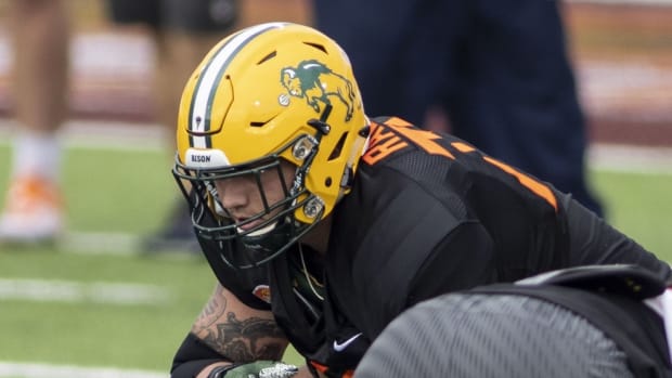 National offensive lineman Dillon Radunz of North Dakota State (75) drills during National team practice during the 2021 Senior Bowl week.