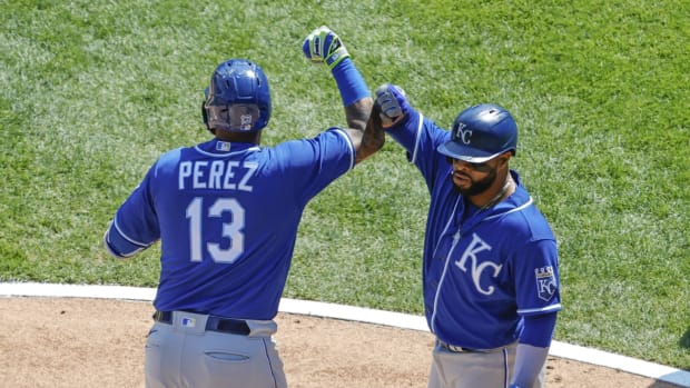 May 14, 2021; Chicago, Illinois, USA; Kansas City Royals catcher Salvador Perez (13) celebrates with first baseman Carlos Santana (41) after hitting a three-run home run against the Chicago White Sox during the third inning of the first game of a doubleheader at Guaranteed Rate Field. Mandatory Credit: Kamil Krzaczynski-USA TODAY Sports