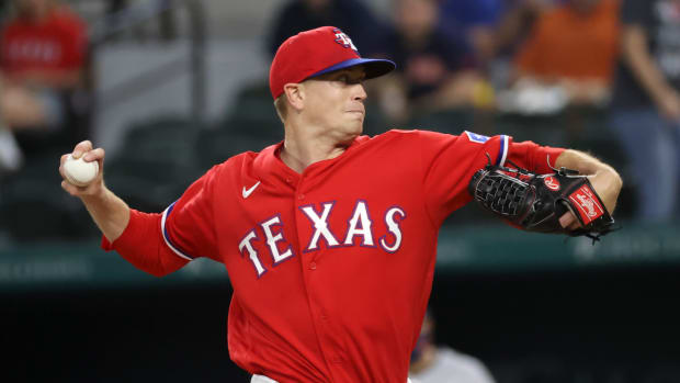 May 21, 2021; Arlington, Texas, USA; Texas Rangers starting pitcher Kyle Gibson (44) throws during the first inning against the Houston Astros at Globe Life Field.