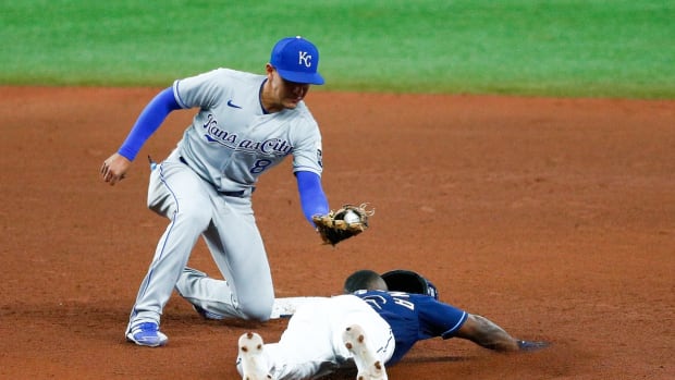 May 26, 2021; St. Petersburg, Florida, USA; Tampa Bay Rays left fielder Randy Arozarena (56) is caught stealing in the fifth inning by Kansas City Royals second baseman Nicky Lopez (8) at Tropicana Field. Mandatory Credit: Nathan Ray Seebeck-USA TODAY Sports