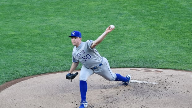 May 28, 2021; Minneapolis, Minnesota, USA; Kansas City Royals starting pitcher Kris Bubic (50) throws a pitch against the Minnesota Twins during the first inning at Target Field. Mandatory Credit: Jeffrey Becker-USA TODAY Sports