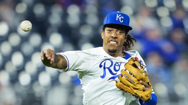May 31, 2021; Kansas City, Missouri, USA; Kansas City Royals shortstop Adalberto Mondesi (27) throws to first base against the Pittsburgh Pirates during the eighth inning at Kauffman Stadium. Mandatory Credit: Jay Biggerstaff-USA TODAY Sports