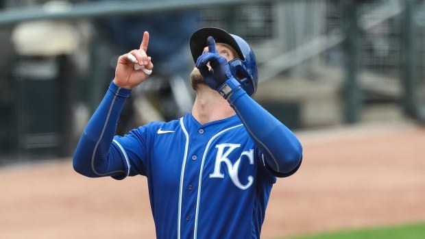 May 30, 2021; Minneapolis, Minnesota, USA; Kansas City Royals designated hitter Hunter Dozier (17) celebrates after hitting a solo home run against the Minnesota Twins in the ninth inning at Target Field. Mandatory Credit: David Berding-USA TODAY Sports
