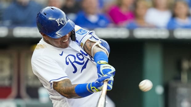 Jun 3, 2021; Kansas City, Missouri, USA; Kansas City Royals designated hitter Salvador Perez (13) hits a home run against the Minnesota Twins during the first inning at Kauffman Stadium. Mandatory Credit: Jay Biggerstaff-USA TODAY Sports
