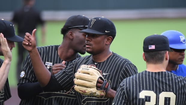 Jun 4, 2021; Nashville, TN, United States; Vanderbilt Commodores pitcher Kumar Rocker (80) after getting out of the first inning against the Presbyterian Blue Hose in the Nashville Regional of the NCAA Baseball Tournament at Hawkins Field. Mandatory Credit: Christopher Hanewinckel-USA TODAY Sports
