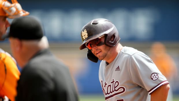 Mississippi State hitter Tanner Allen (5) takes an extra few minutes to recover after fouling a ball off his foot or ankle while batting against Tennessee during the SEC Tournament Thursday, May 27, 2021, in the Hoover Met in Hoover, Alabama. [Staff Photo/Gary Cosby Jr.] Sec Tournament Tennessee Vs Mississippi State