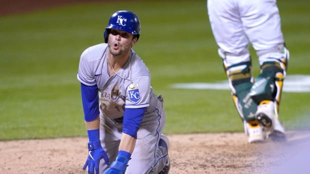Jun 11, 2021; Oakland, California, USA; Kansas City Royals left fielder Andrew Benintendi (16) reacts after being thrown out at home against the Oakland Athletics during the eighth inning at RingCentral Coliseum. Mandatory Credit: Cary Edmondson-USA TODAY Sports