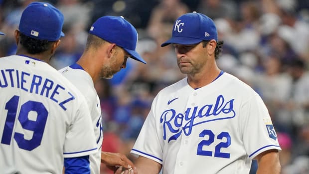 Jun 15, 2021; Kansas City, Missouri, USA; Kansas City Royals manager Mike Matheny (22) comes to the mound as starting pitcher Mike Minor (23) leaves the game in the sixth inning against the Detroit Tigers at Kauffman Stadium. Mandatory Credit: Denny Medley-USA TODAY Sports