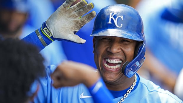 Jun 16, 2021; Kansas City, Missouri, USA; Kansas City Royals designated hitter Salvador Perez (13) celebrates in the dugout after hitting a home run against the Detroit Tigers during the third inning at Kauffman Stadium. Mandatory Credit: Jay Biggerstaff-USA TODAY Sports