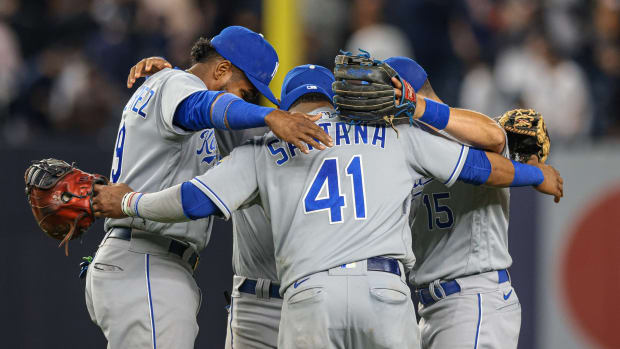 Jun 22, 2021; Bronx, New York, USA; Kansas City Royals first baseman Carlos Santana (41) celebrates with teammates after their game against the New York Yankees at Yankee Stadium. Mandatory Credit: Vincent Carchietta-USA TODAY Sports