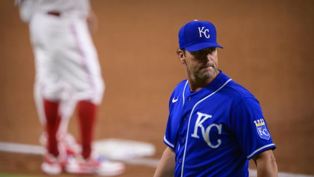 Jun 26, 2021; Arlington, Texas, USA; Kansas City Royals manager Mike Matheny (22) walks off the field during the second inning against the Texas Rangers at Globe Life Field. Mandatory Credit: Jerome Miron-USA TODAY Sports