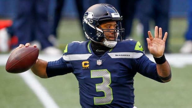 Seattle Seahawks quarterback Russell Wilson (3) passes against the Los Angeles Rams during the first quarter at Lumen Field