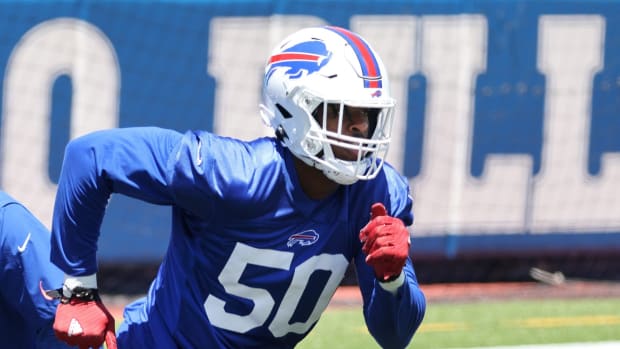 Bills rookie Greg Rousseau (50) runs a drill during minicamp.