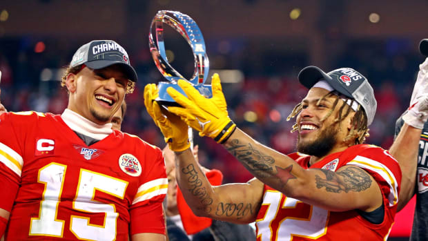 Jan 19, 2020; Kansas City, Missouri, USA; Kansas City Chiefs quarterback Patrick Mahomes (15) and strong safety Tyrann Mathieu (32) celebrate with the Lamar Hunt Trophy after beating the Tennessee Titans in the AFC Championship Game at Arrowhead Stadium. Mandatory Credit: Mark J. Rebilas-USA TODAY Sports