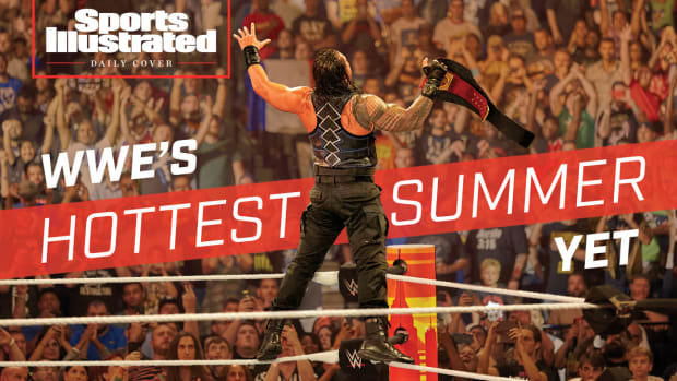 Daily Cover image: Roman Reigns faces a raucous crowd. Text reads "WWE's Hottest Summer Yet"