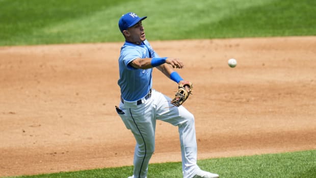 Jul 18, 2021; Kansas City, Missouri, USA; Kansas City Royals second baseman Nicky Lopez (8) throws to first base against the Baltimore Orioles during the second inning at Kauffman Stadium. Mandatory Credit: Jay Biggerstaff-USA TODAY Sports