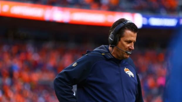 Denver Broncos quarterbacks coach Greg Knapp against the New England Patriots in the AFC Championship football game at Sports Authority Field at Mile High. The Broncos defeated the Patriots 20-18 to advance to the Super Bowl.