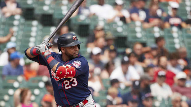 Jul 18, 2021; Detroit, Michigan, USA; Minnesota Twins designated hitter Nelson Cruz (23) at bat against the Detroit Tigers at Comerica Park.