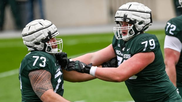 Michigan State's Jarrett Horst, right, battles with Jacob Isaia as part of a drill during the spring football game on Saturday, April 24, 2021, at Spartan Stadium in East Lansing.