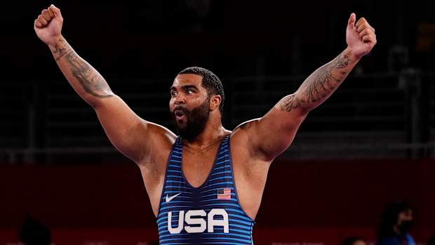 Olympic wrestler Gable Steveson celebrates.