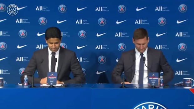 Lionel Messi shows off new jersey at first press conference