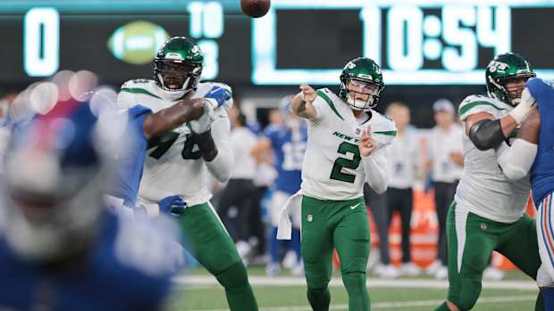 Jets QB Zach Wilson throws pass in preseason