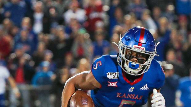 Kansas Jayhawks wide receiver Stephon Robinson Jr. (5) runs against the Texas Tech Red Raiders during the first half at David Booth Kansas Memorial Stadium. Jay Biggerstaff-USA TODAY Sports