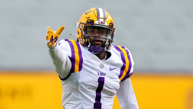 Apr 17, 2021; Baton Rouge, Louisiana, USA; LSU Tigers wide receiver Kayshon Boutte (1) reacts to making a catch against LSU Tigers cornerback Derek Stingley Jr. (24) during the first half of the annual Purple and White spring game at Tiger Stadium.