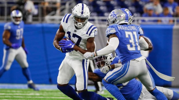 Detroit Lions safety Dean Marlowe (31) defends Indianapolis Colts wide receiver Mike Strachan (17) during the first half of a preseason game at Ford Field in Detroit on Friday, Aug. 27, 2021.