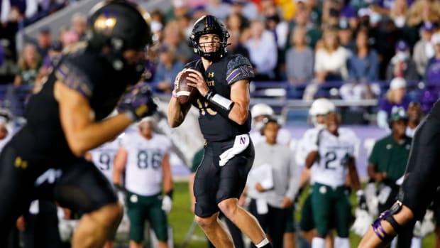 Northwestern Wildcats quarterback Hunter Johnson (15) looks to pass the ball against the Michigan State Spartans during the second quarter at Ryan Field. Jon Durr-USA TODAY Sports