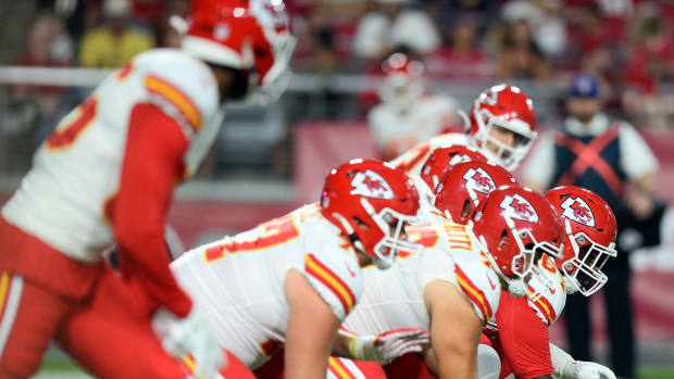 Aug 20, 2021; Glendale, Arizona, USA; The Kansas City Chiefs offensive line gets in position against the Arizona Cardinals during the second half at State Farm Stadium. Mandatory Credit: Joe Camporeale-USA TODAY Sports