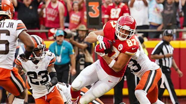 Sep 12, 2021; Kansas City, Missouri, USA; Kansas City Chiefs tight end Travis Kelce (87) scores a touchdown against the Cleveland Browns during the second half at GEHA Field at Arrowhead Stadium. Mandatory Credit: Jay Biggerstaff-USA TODAY Sports