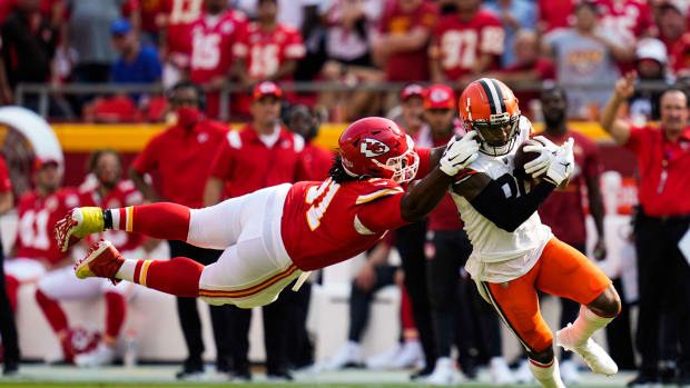 Kansas City Chiefs nose tackle Derrick Nnadi (91) is called for a facemask penalty on Cleveland Browns wide receiver Jarvis Landry (80) during the first half at GEHA Field at Arrowhead Stadium.