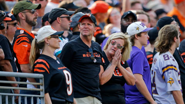 Cincinnati Bengals fans watch a replay as the chains come out to measure a run by Cincinnati Bengals running back Joe Mixon (28) in overtime of the NFL Week One game between the Cincinnati Bengals and the Minnesota Vikings at Paul Brown Stadium in downtown Cincinnati on Sunday, Sept. 12, 2021. The Bengals won 27-24 on a last minute field goal in overtime.

Minnesota Vikings At Cincinnati Bengals