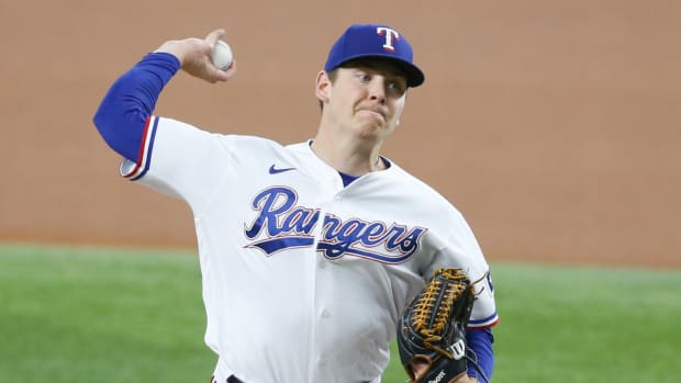 Sep 18, 2021; Arlington, Texas, USA; Texas Rangers starting pitcher Spencer Howard (31) throws a pitch in the first inning against the Chicago White Sox at Globe Life Field.