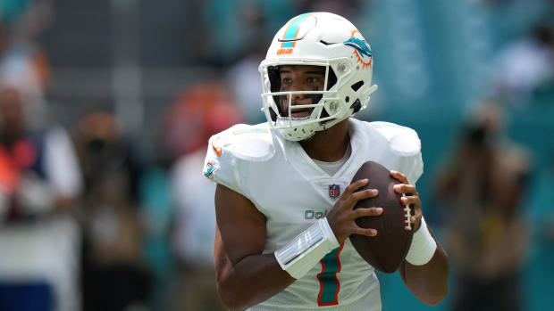 Sep 19, 2021; Miami Gardens, Florida, USA; Miami Dolphins quarterback Tua Tagovailoa (1) attempts a pass against the Buffalo Bills during the first half at Hard Rock Stadium.
