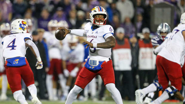 Nov 26, 2022; Manhattan, Kansas, USA; Kansas Jayhawks quarterback Jalon Daniels (6) drops back to pass during the first quarter against the Kansas State Wildcats at Bill Snyder Family Football Stadium.